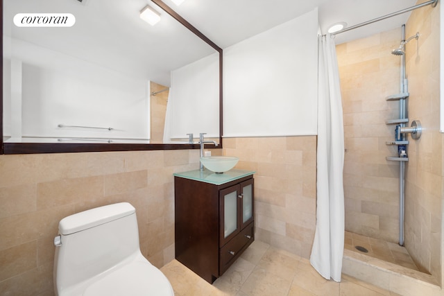 103 Quentin Rd Unit B503, New York City, NY 11223 - bathroom with vanity, tile walls, a tile shower, and toilet