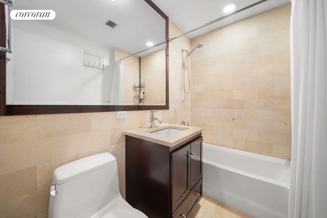 103 Quentin Rd Unit B503, New York City, NY 11223 - bathroom with shower / tub combo with curtain, vanity, toilet, tile walls, and tile patterned flooring
