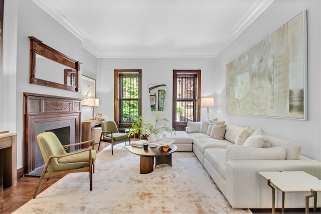 307 E 87th St, New York City, NY 10128 - living area featuring a fireplace, crown molding, and wood finished floors
