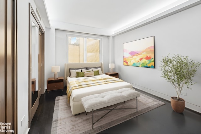 860 5th Ave Unit 11H, New York City, NY 10065 - bedroom with a closet and wood finished floors