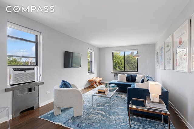 159-34 Riverside Dr W Unit 5A, New York City, NY 10032 - living room featuring wood finished floors, baseboards, and cooling unit