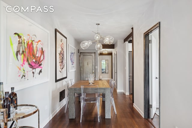 159-34 Riverside Dr W Unit 5A, New York City, NY 10032 - dining room featuring a chandelier, dark wood-type flooring, and baseboards