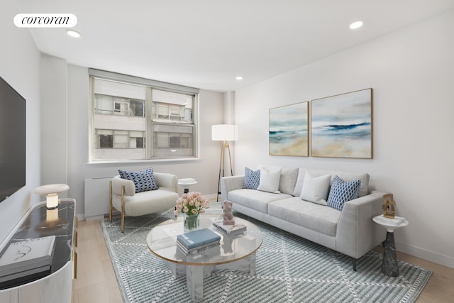 200 E 58th St Unit 12A, New York City, NY 10022 - living room featuring light wood finished floors, recessed lighting, and baseboards