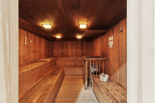 300 E 40th St Unit 6X, New York City, NY 10016 - relaxing sauna / steam room featuring wooden walls, wooden ceiling, and hardwood / wood-style floors