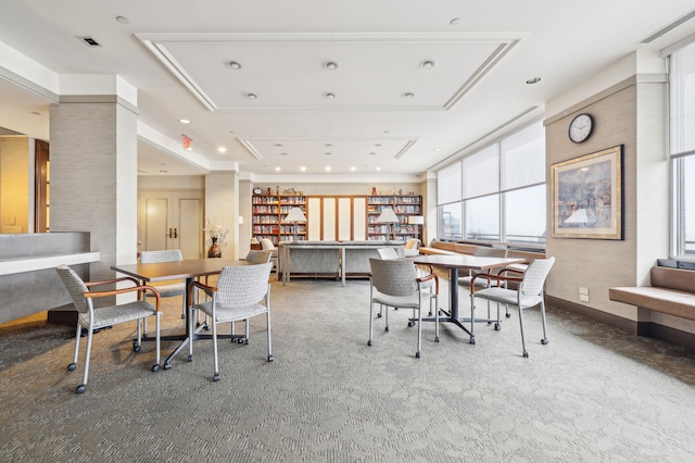 300 E 40th St Unit 6X, New York City, NY 10016 - dining room with recessed lighting, carpet flooring, and a tray ceiling