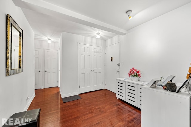 235 E 57th St Unit 14C, New York City, NY 10022 - bedroom featuring dark wood-type flooring