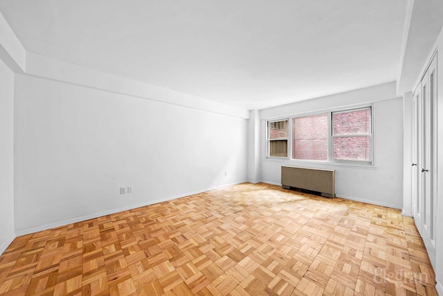 445 E 86th St Unit 6G, New York City, NY 10028 - unfurnished room featuring baseboards