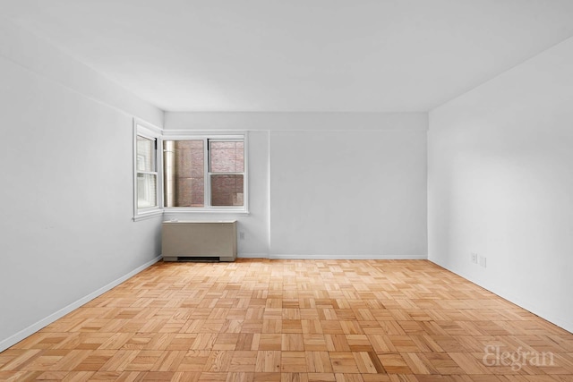 445 E 86th St Unit 6G, New York City, NY 10028 - empty room with baseboards and radiator