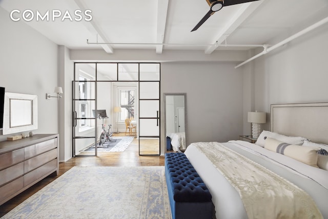 129 W 22nd St Unit 5A, New York City, NY 10011 - bedroom with wood finished floors and beamed ceiling