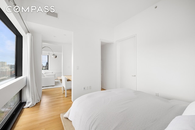 123 3rd Ave Unit 9C, New York City, NY 10003 - bedroom featuring light wood-type flooring