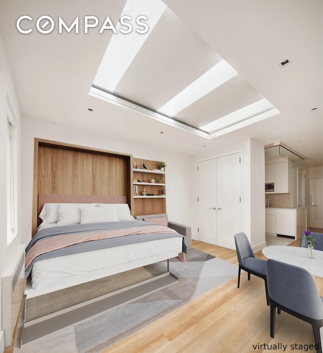 435 E 85th St Unit 4F, New York City, NY 10028 - bedroom featuring light wood-type flooring and a closet