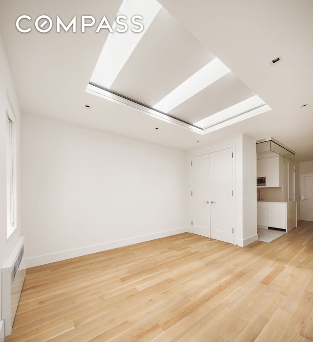 435 E 85th St Unit 4F, New York City, NY 10028 - bonus room with radiator and light wood-type flooring