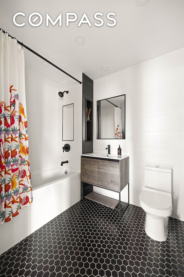511 Evergreen Ave Unit 3D, New York City, NY 11221 - bathroom featuring shower / bath combo, vanity, and toilet