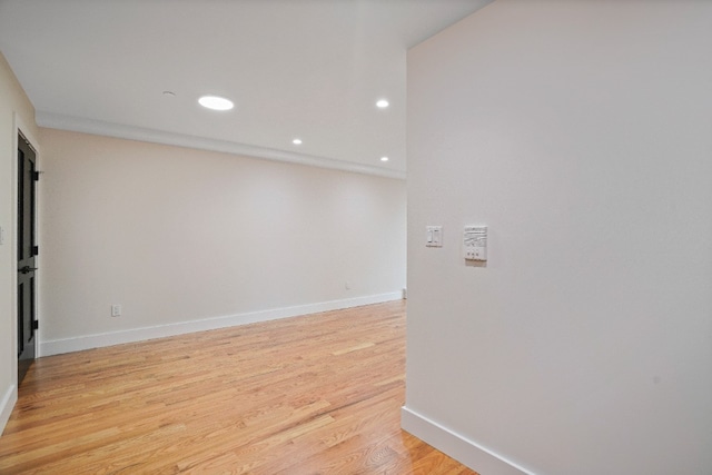 60-14 Menahan St, New York City, NY 11385 - spare room featuring light wood-type flooring and recessed lighting