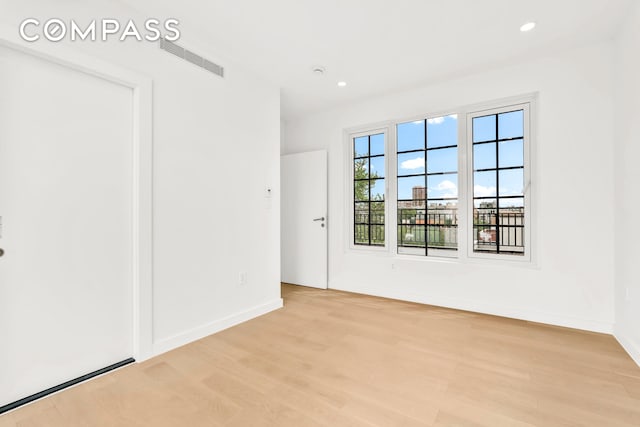90 Herbert St Ph, Ph, New York City, NY 11222 - empty room featuring wood finished floors and recessed lighting