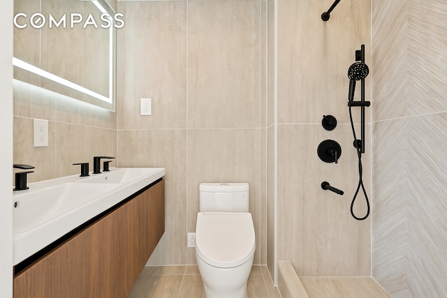 90 Herbert St Ph, Ph, New York City, NY 11222 - bathroom with tiled shower, double vanity, tile walls, and tile patterned flooring