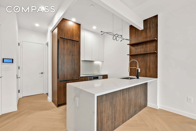 90 Herbert St Unit 3A, New York City, NY 11222 - kitchen featuring modern cabinets, open shelves, a peninsula, white cabinetry, and light stone countertops