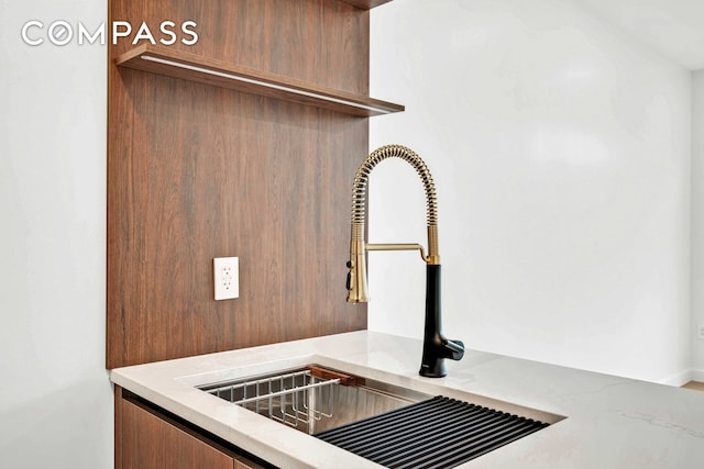90 Herbert St Unit 3A, New York City, NY 11222 - kitchen view of a sink and light stone countertops