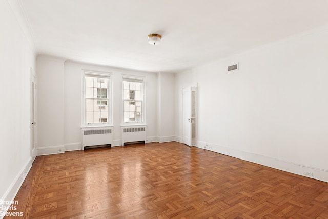 956 5th Ave Unit 11Thfloor, New York City, NY 10075 - unfurnished room with radiator and baseboards