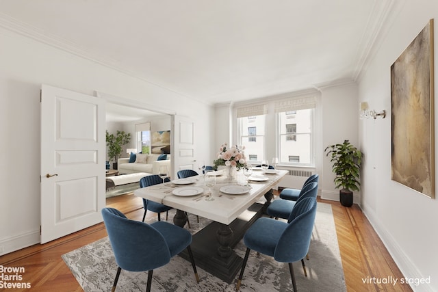 956 5th Ave Unit 11Thfloor, New York City, NY 10075 - dining space featuring ornamental molding and radiator