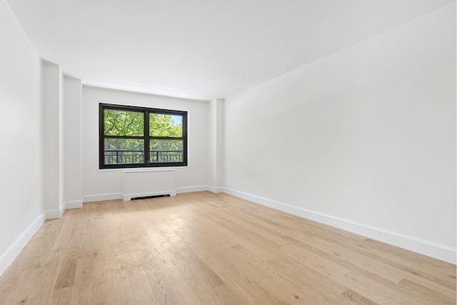142 W End Ave Unit 2U, New York City, NY 10023 - unfurnished room featuring light wood-type flooring, radiator, and baseboards