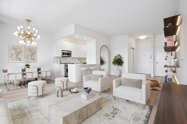 180 W End Ave Unit 30R, New York City, NY 10023 - living room with a chandelier, light wood-style flooring, and recessed lighting