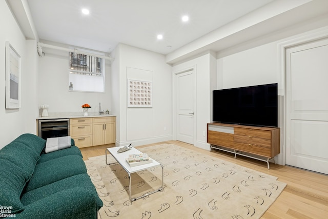 780 W End Ave Unit M1, New York City, NY 10025 - living room with beverage cooler, wet bar, light wood finished floors, and recessed lighting