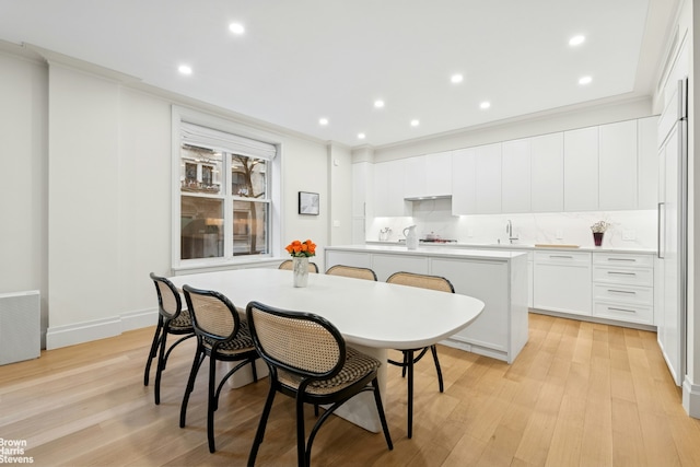 780 W End Ave Unit M1, New York City, NY 10025 - dining space featuring light wood-style floors, recessed lighting, and ornamental molding