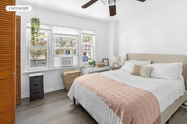 21 E 4th St, New York City, NY 11218 - bedroom featuring wood finished floors and a ceiling fan