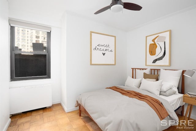 245 E 25th St Unit 6L, New York City, NY 10010 - bedroom with a ceiling fan and baseboards
