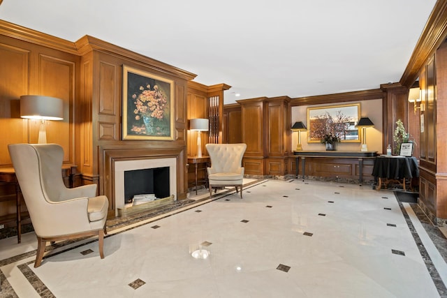 137 E 36th St Unit 5B, New York City, NY 10016 - living area featuring inlaid floor details, a fireplace with raised hearth, and ornamental molding