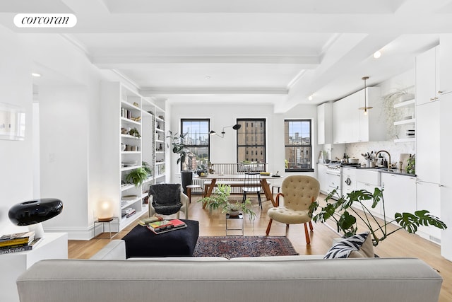 170 2nd Ave Unit 9B, New York City, NY 10003 - living area with light wood-type flooring and crown molding