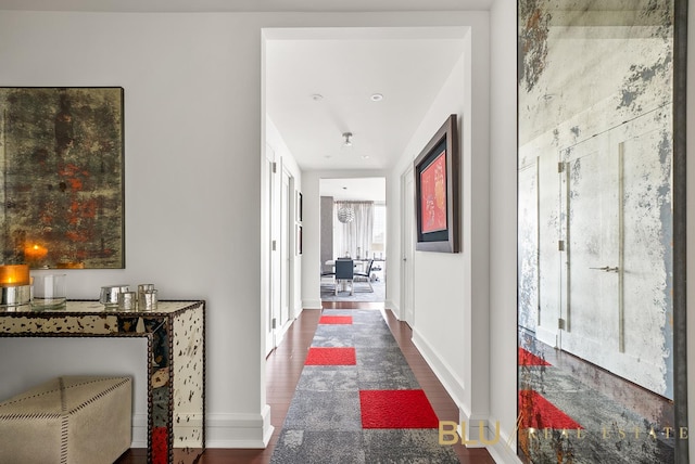 60 Riverside Blvd Unit 2403, New York City, NY 10069 - corridor featuring baseboards and wood finished floors