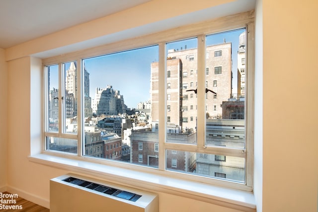 30 E 62nd St Unit 11A, New York City, NY 10065 - detailed view of a city view, radiator, and baseboards