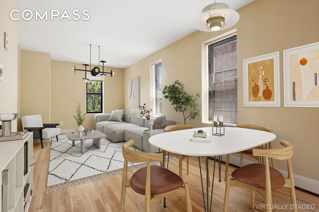 680 81st St Unit 3D, New York City, NY 11228 - dining space with light wood-type flooring and baseboards