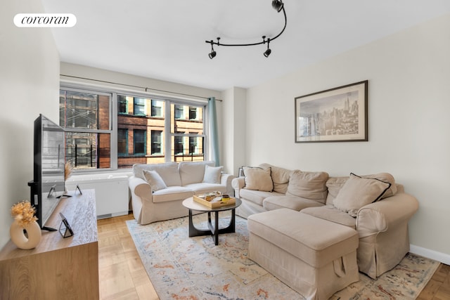 60 W 13th St Unit 8B, New York City, NY 10011 - living room with baseboards and rail lighting