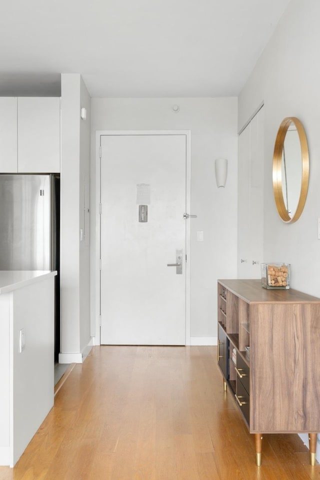 189 Schermerhorn St Unit 16C, New York City, NY 11201 - entrance foyer with light wood-style flooring and baseboards
