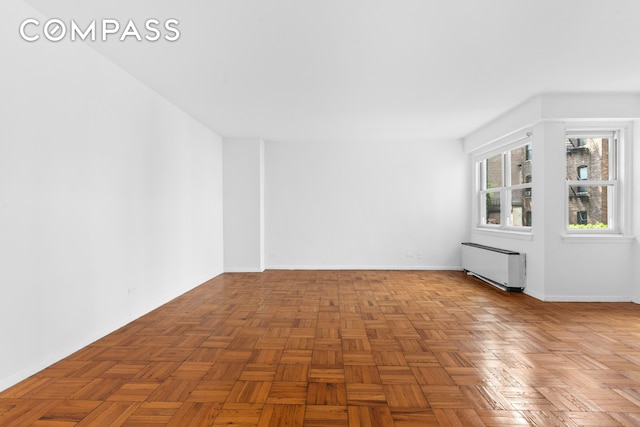 101 W 12th St Unit 3Z, New York City, NY 10011 - additional living space with radiator heating unit and baseboards