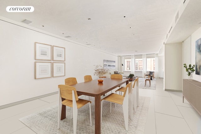 145 6th Ave Unit 5C, New York City, NY 10013 - dining area with light tile patterned floors