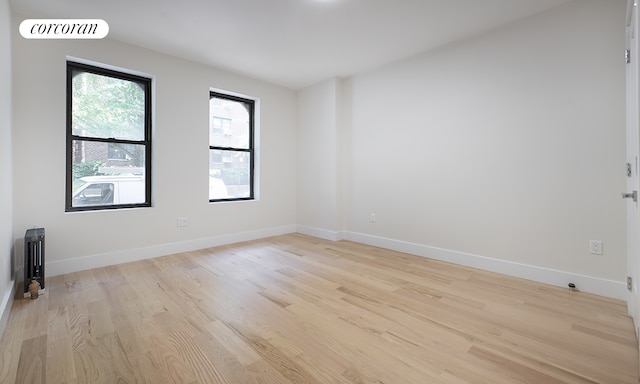 325 E 80th St Unit 1F, New York City, NY 10075 - empty room featuring light wood finished floors and baseboards