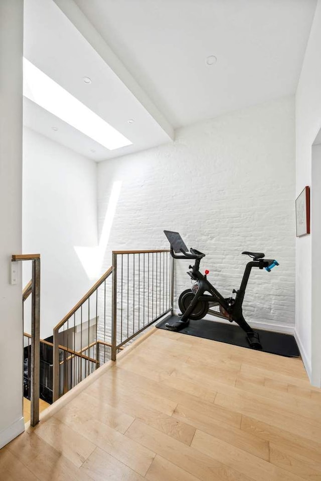 204 W Houston St Unit 4A/5A, New York City, NY 10014 - workout area with wood finished floors and baseboards