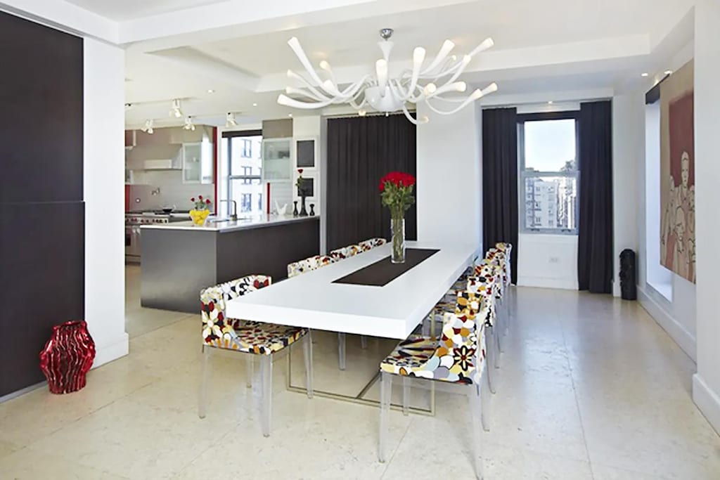 27 W 72nd St Unit 1410, New York City, NY 10023 - dining space with a chandelier and a raised ceiling