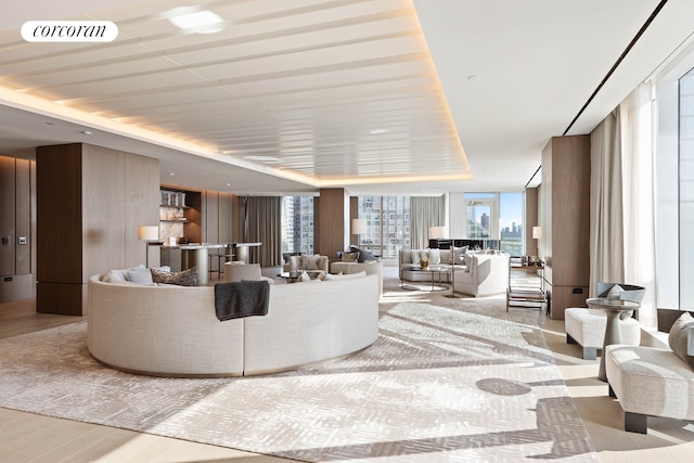 30 Riverside Blvd Unit 20C, New York City, NY 10069 - living area with a tray ceiling and wood finished floors