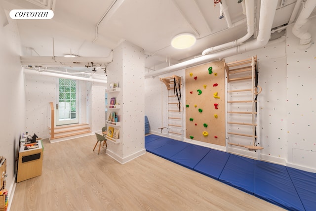 114 E 90th St Unit 5B, New York City, NY 10128 - miscellaneous room featuring wood finished floors