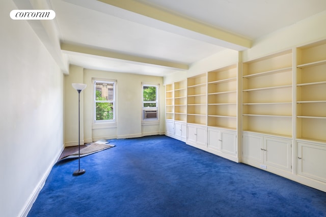 114 E 90th St Unit 5B, New York City, NY 10128 - empty room with dark carpet, beam ceiling, cooling unit, and built in shelves