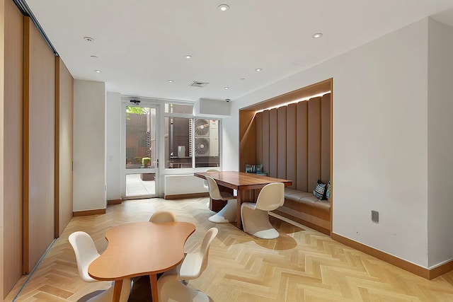 389 E 89th St Unit 27A, New York City, NY 10128 - dining area featuring baseboards and recessed lighting