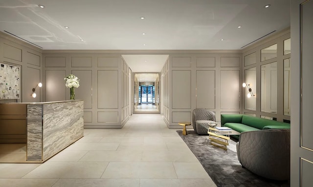 389 E 89th St Unit 27A, New York City, NY 10128 - building lobby featuring a decorative wall