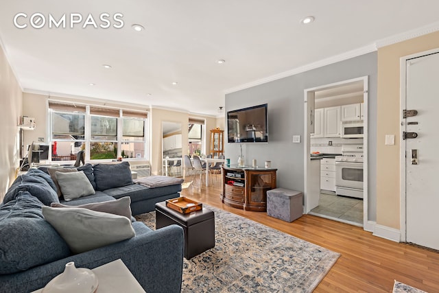 5730 Mosholu Ave Unit 4Ff, New York City, NY 10471 - living area with crown molding, light wood-style floors, and recessed lighting
