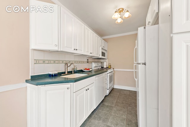 5730 Mosholu Ave Unit 4Ff, New York City, NY 10471 - kitchen featuring a sink, white appliances, dark countertops, white cabinets, and crown molding