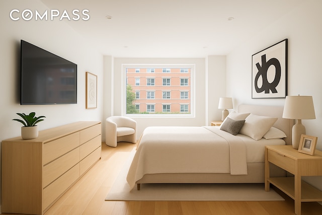 15 Charles St Unit 2H, New York City, NY 10014 - bedroom with light wood-style flooring